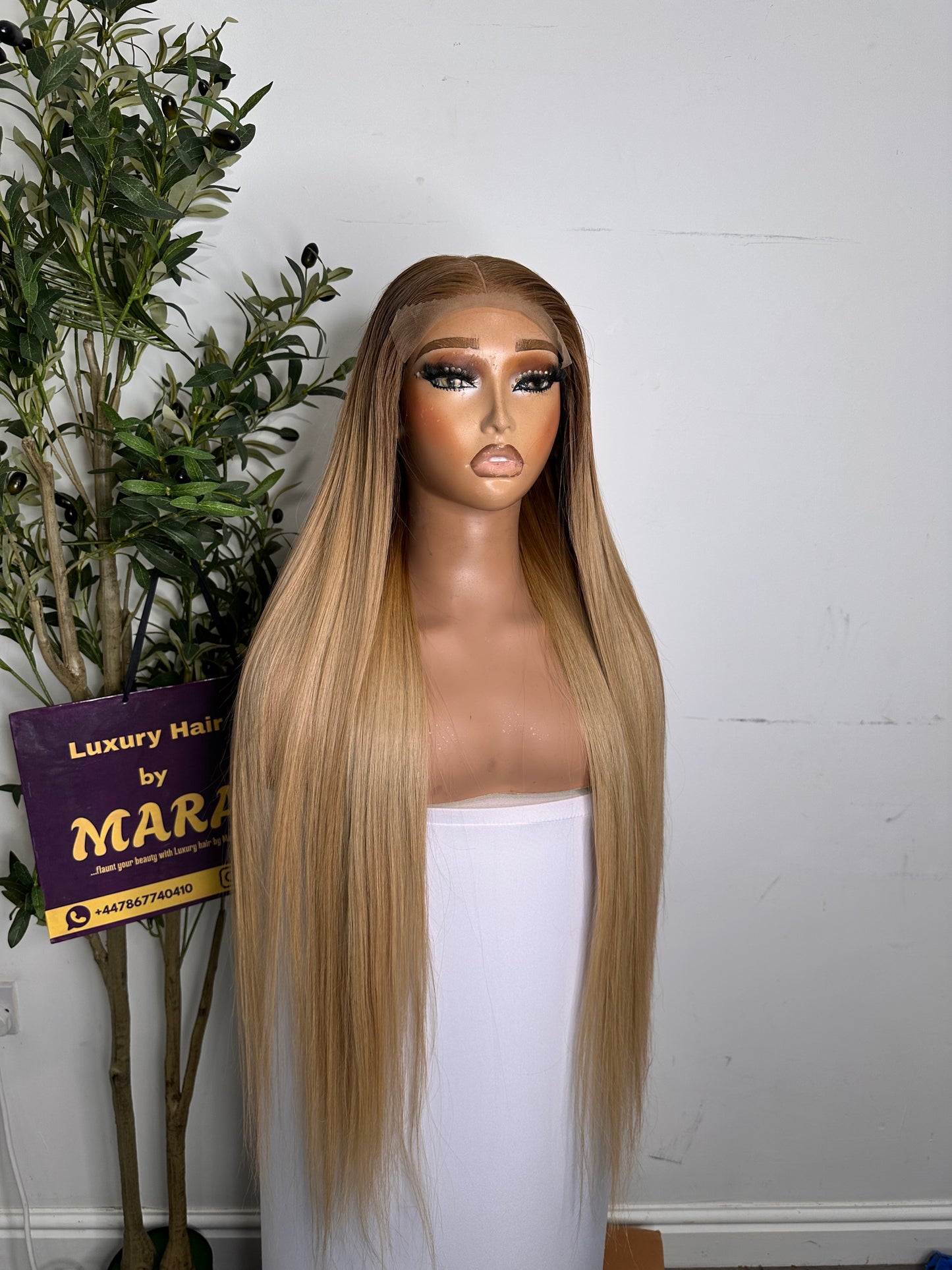 30 inches Luxury Donor(raw) Vietnamese bone straight , piano blonde, with 5by5 glueless closure. 350g