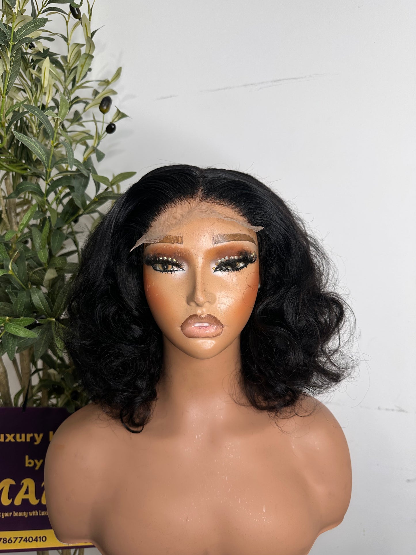 12 inches Boumcy unit, beautiful unit, perfect bounce with permanent bounce. Natural colour . With 5by5 closure .