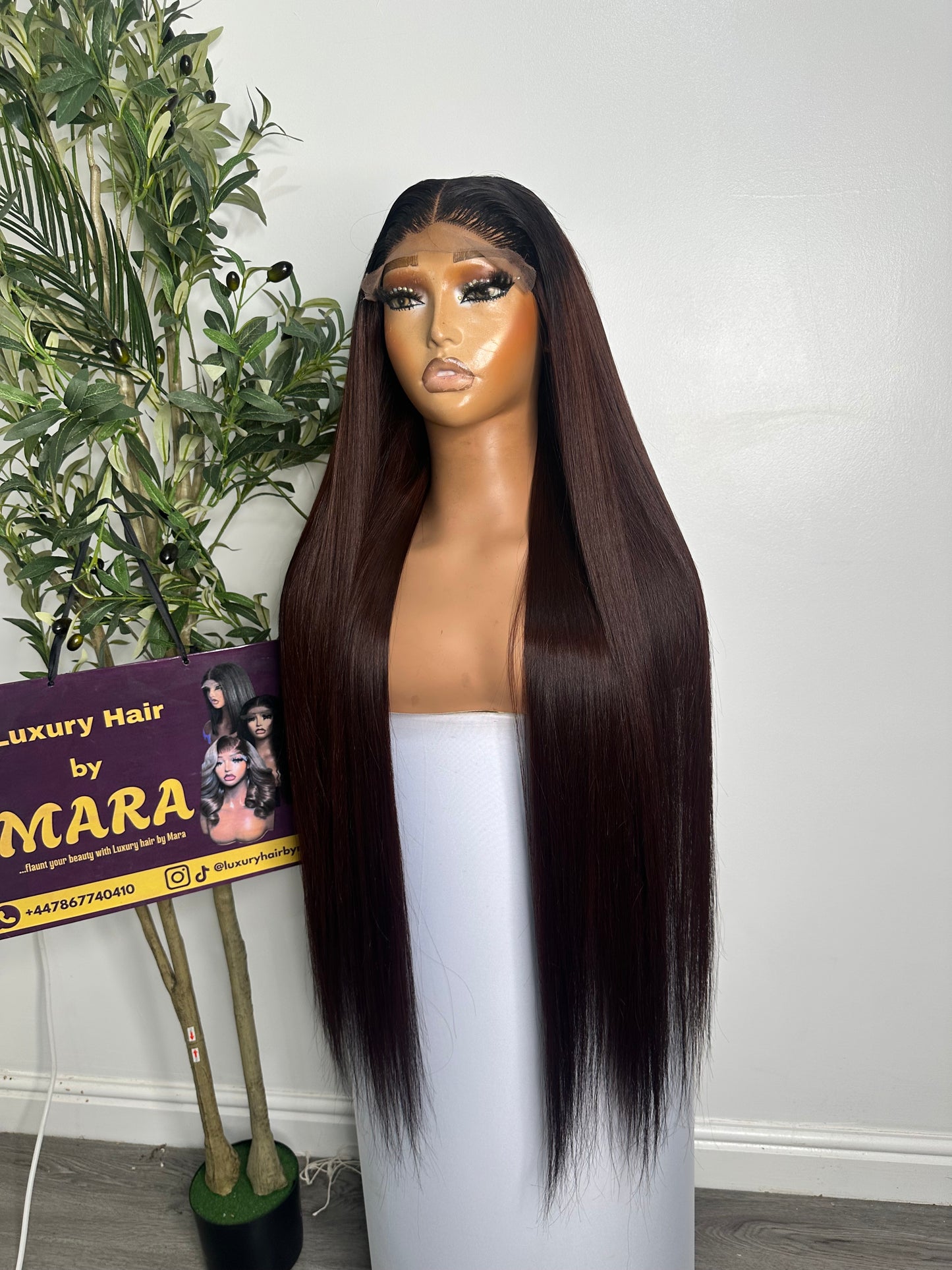 30 inches SDD Vietnamese bone straight wig, 350g density with 5by5 glueless closure. Very dark burgundy.