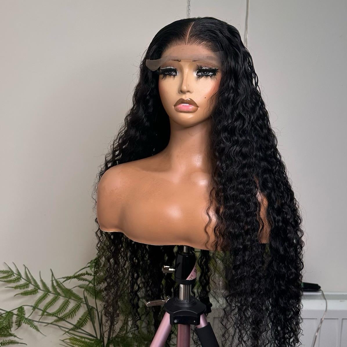 32 inches Peruvian deep wave  Super Double Drawn with 5by5 mini frontal.. Natural colour.