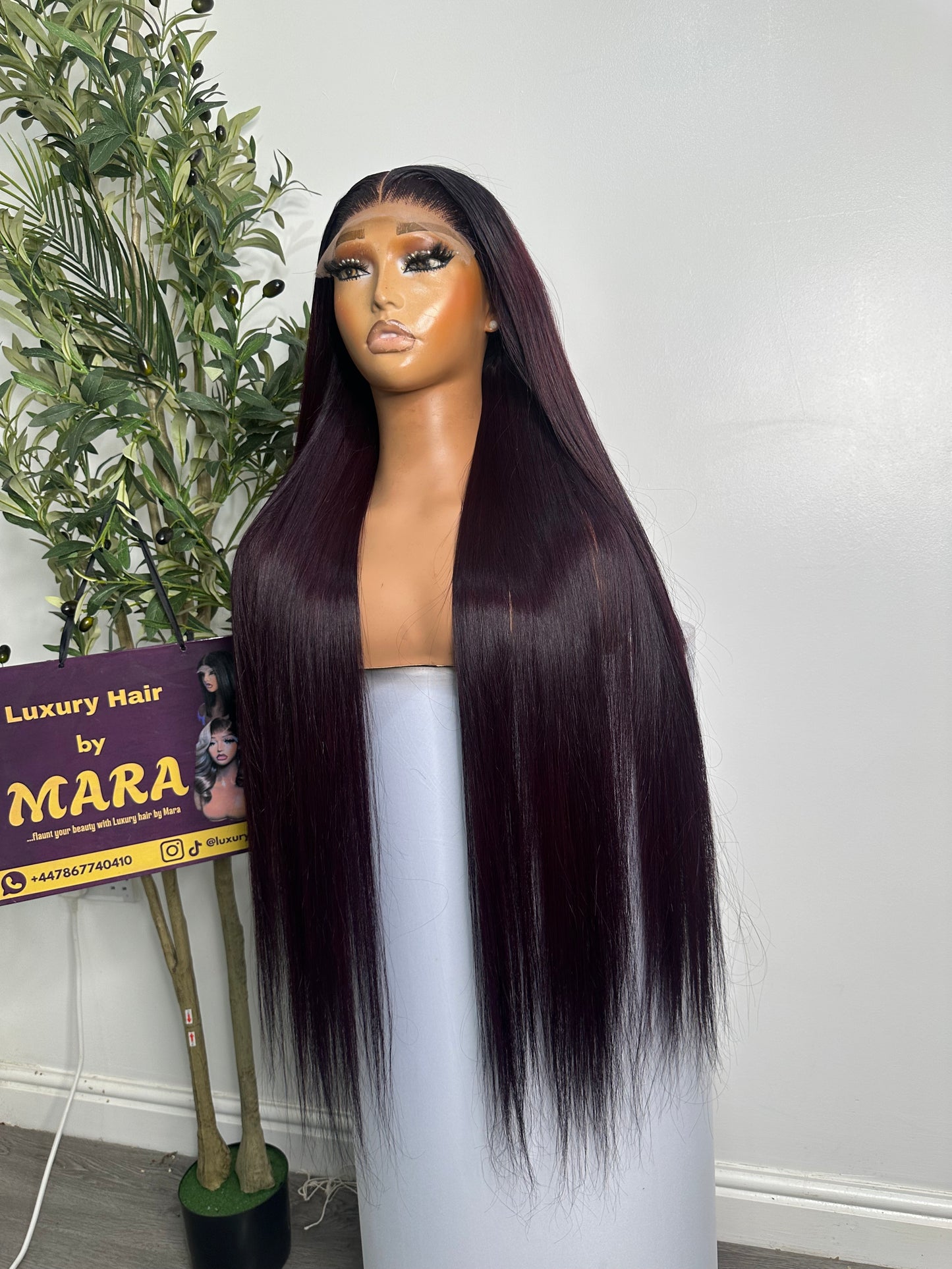 30 inches SDD Vietnamese bone straight wig, 350g density with 5by5 glueless closure. Very dark burgundy.