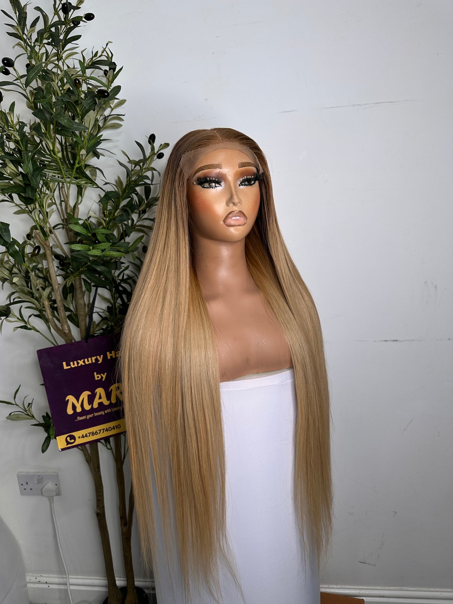 30 inches Luxury Donor(raw) Vietnamese bone straight , piano blonde, with 5by5 glueless closure. 350g