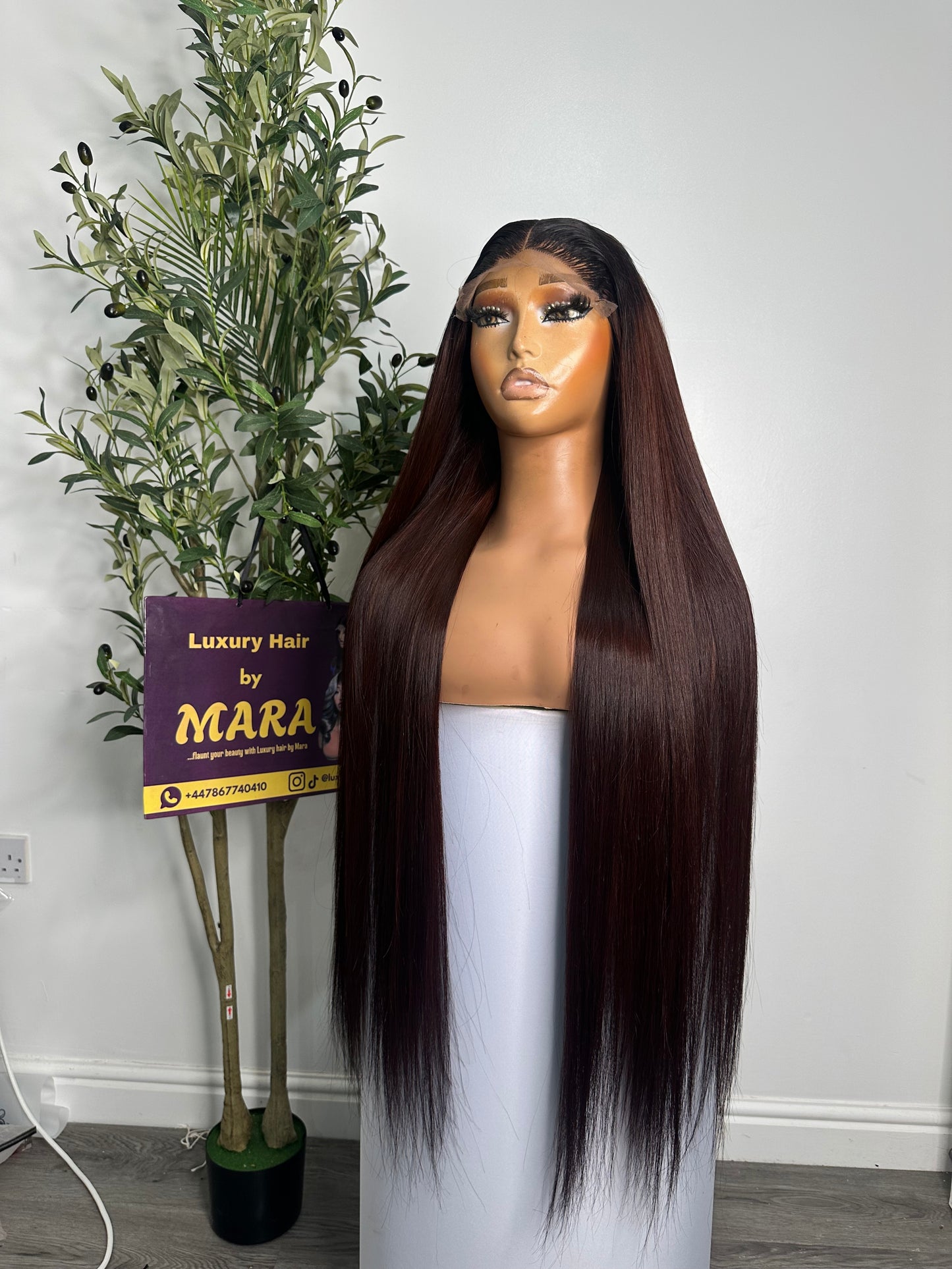 30 inches SDD Vietnamese bone straight wig, 350g density with 5by5 glueless closure. Very dark burgundy.