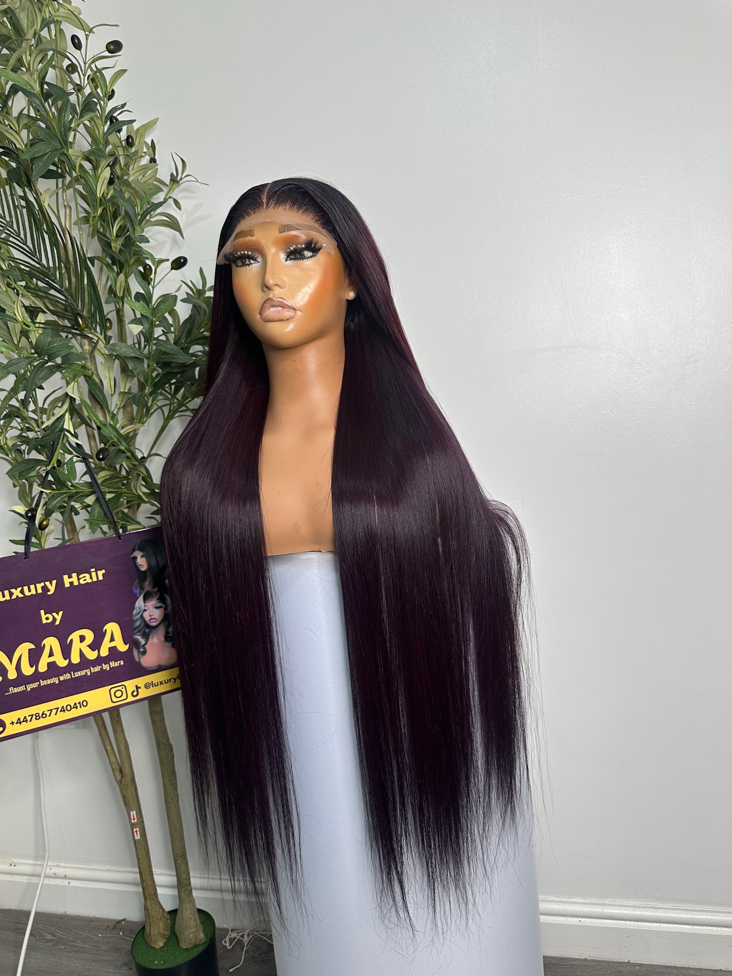 30 inches SDD Vietnamese bone straight wig, 350g density with 5by5 glueless closure. Very dark burgundy.