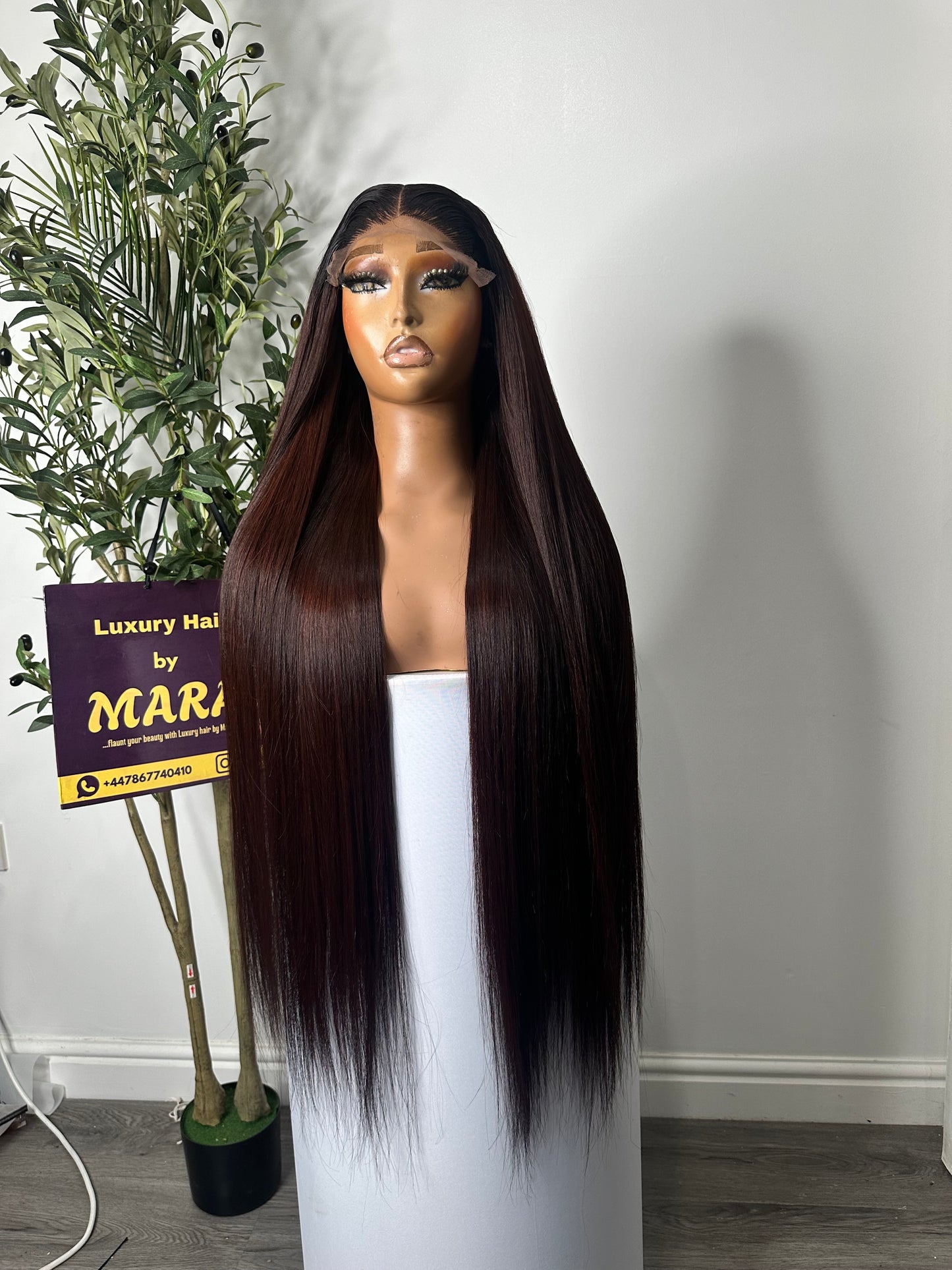 30 inches SDD Vietnamese bone straight wig, 350g density with 5by5 glueless closure. Very dark burgundy.