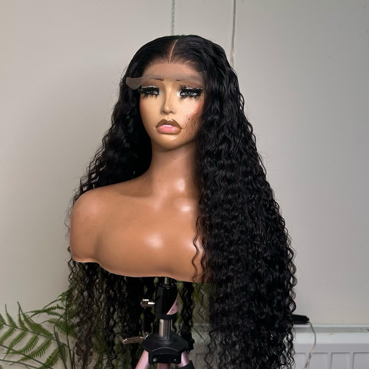 32 inches Peruvian deep wave  Super Double Drawn with 5by5 mini frontal.. Natural colour.