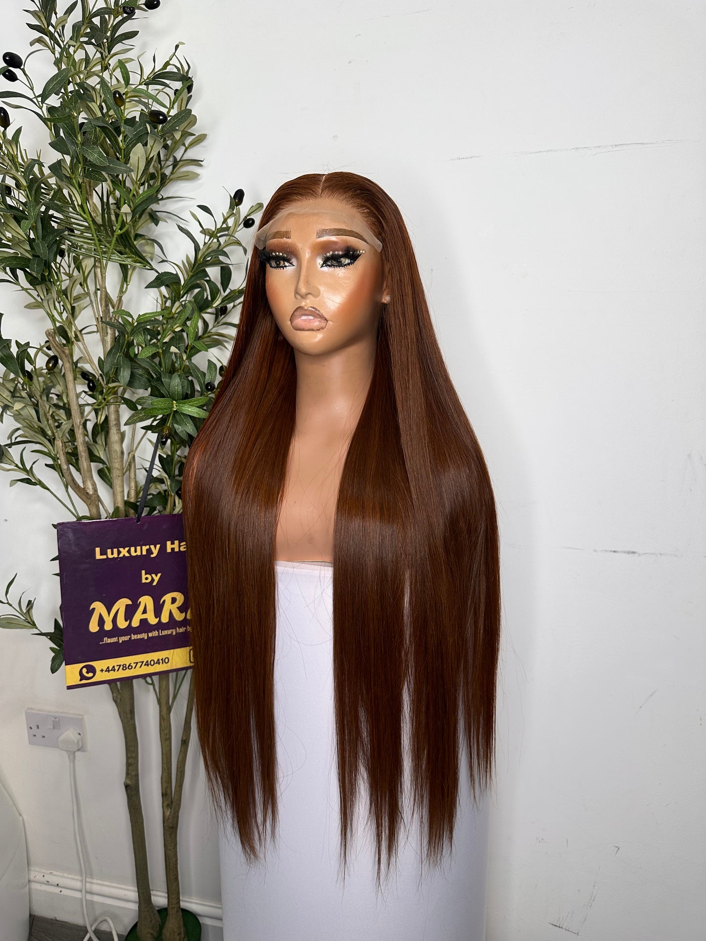 26 inches Vietnamese bone straight with 5by5 closure. 100% human hair. Dark Cajun colour. 300g