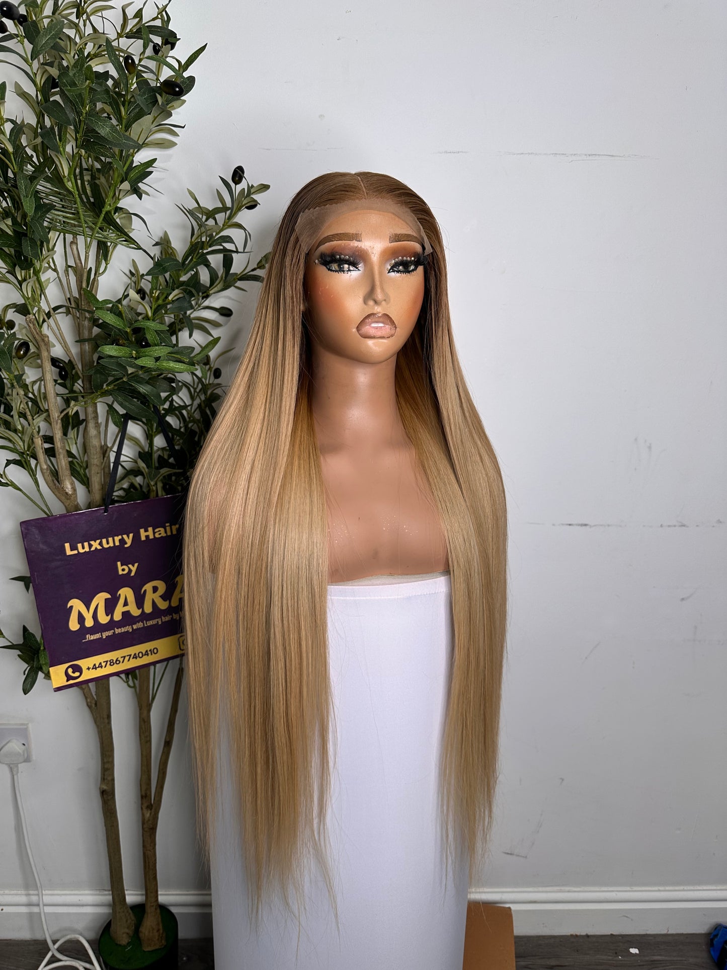 30 inches Luxury Donor(raw) Vietnamese bone straight , piano blonde, with 5by5 glueless closure. 350g