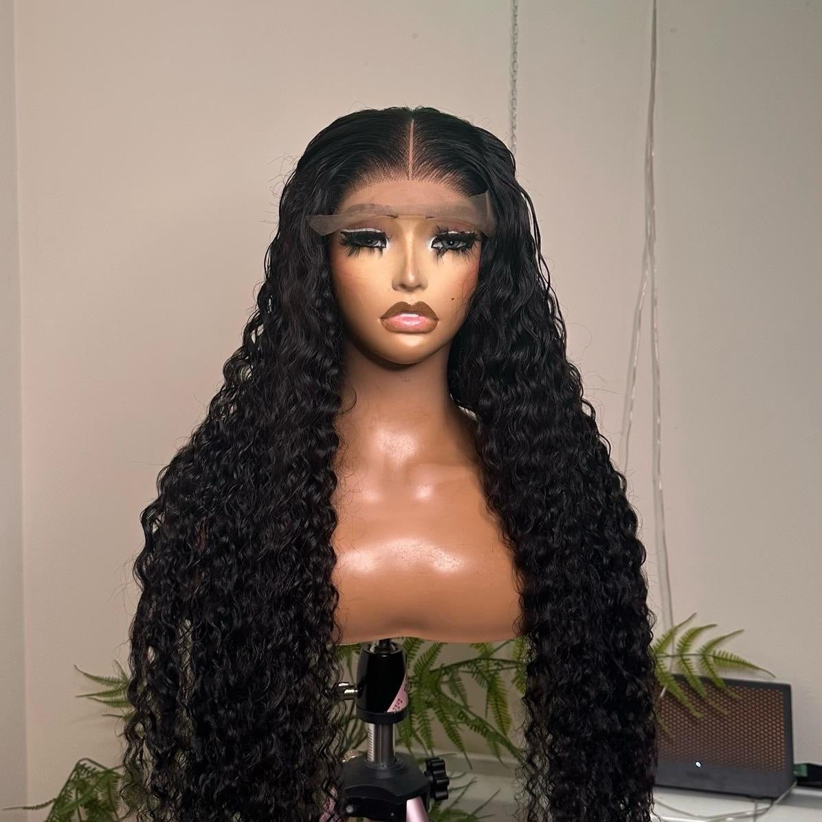 32 inches Peruvian deep wave  Super Double Drawn with 5by5 mini frontal.. Natural colour.