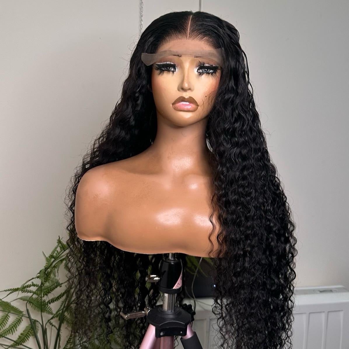 32 inches Peruvian deep wave  Super Double Drawn with 5by5 mini frontal.. Natural colour.