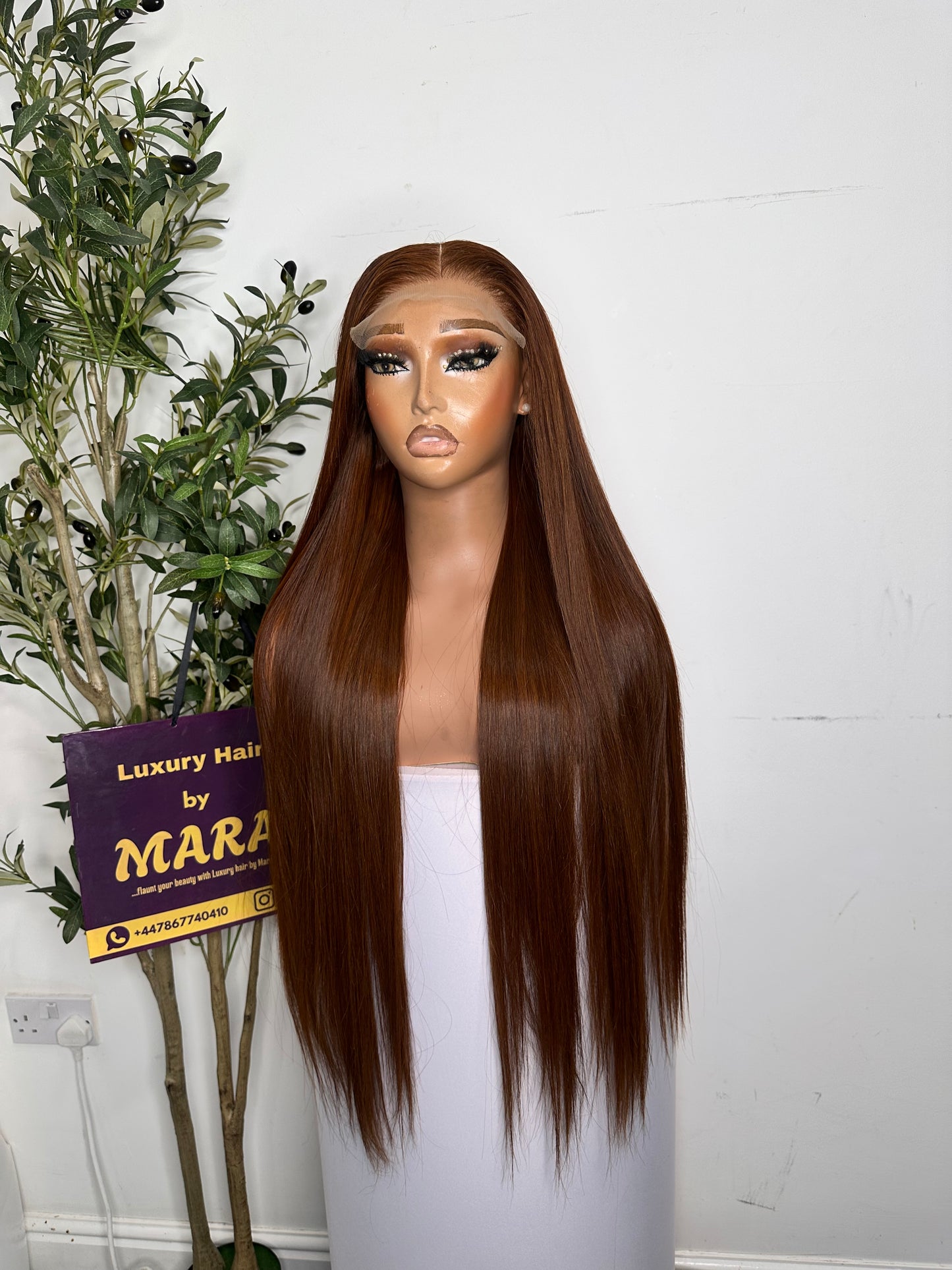 26 inches Vietnamese bone straight with 5by5 closure. 100% human hair. Dark Cajun colour. 300g