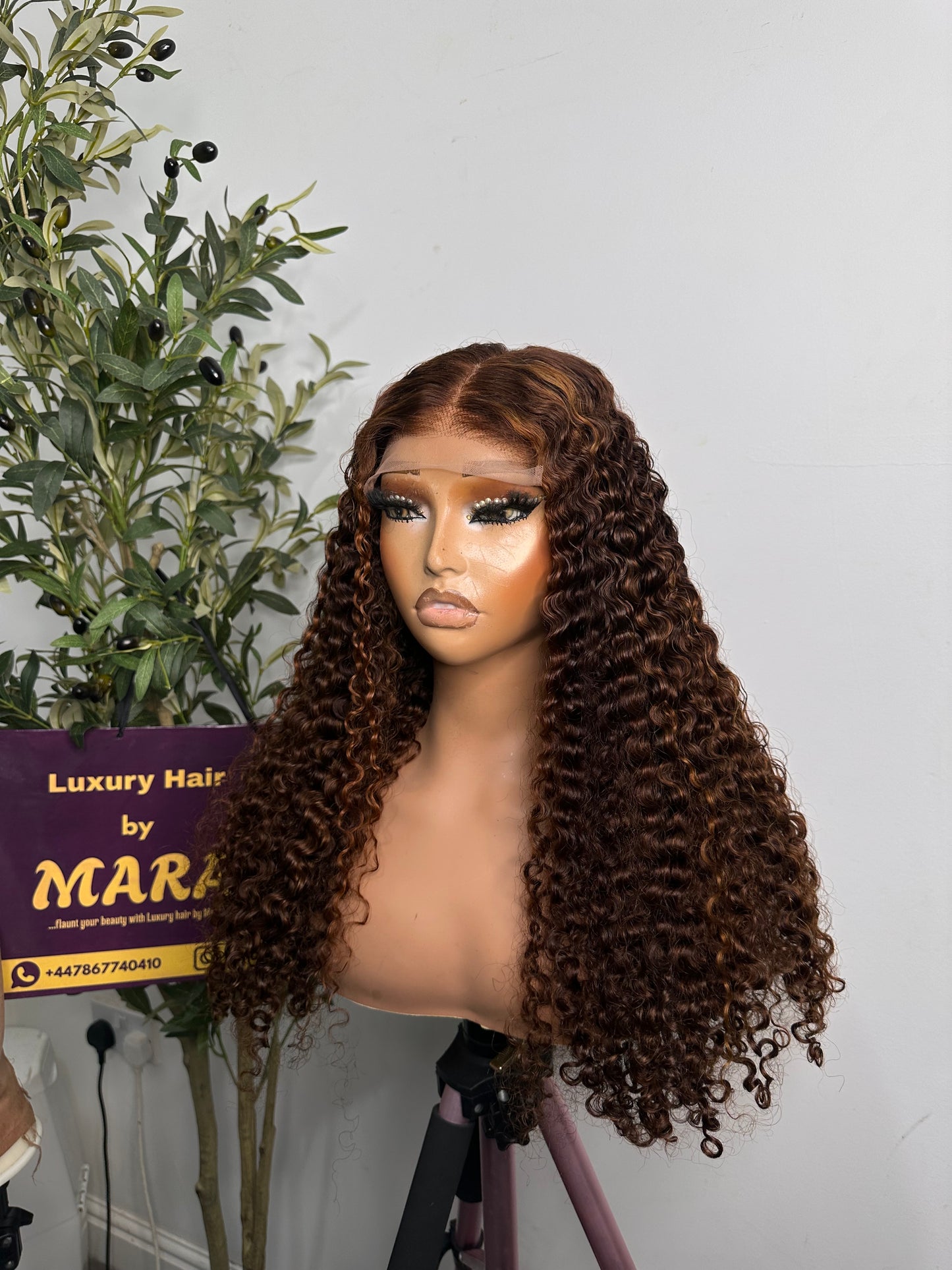 26 inches SDD French curls, 350g density with 5by5 closure. Piano colour.